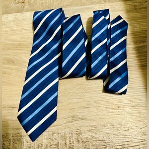 CERRUTI 1881 tie. 100% Silk Striped in blue and white. Handmade. 3.5” wide Clean